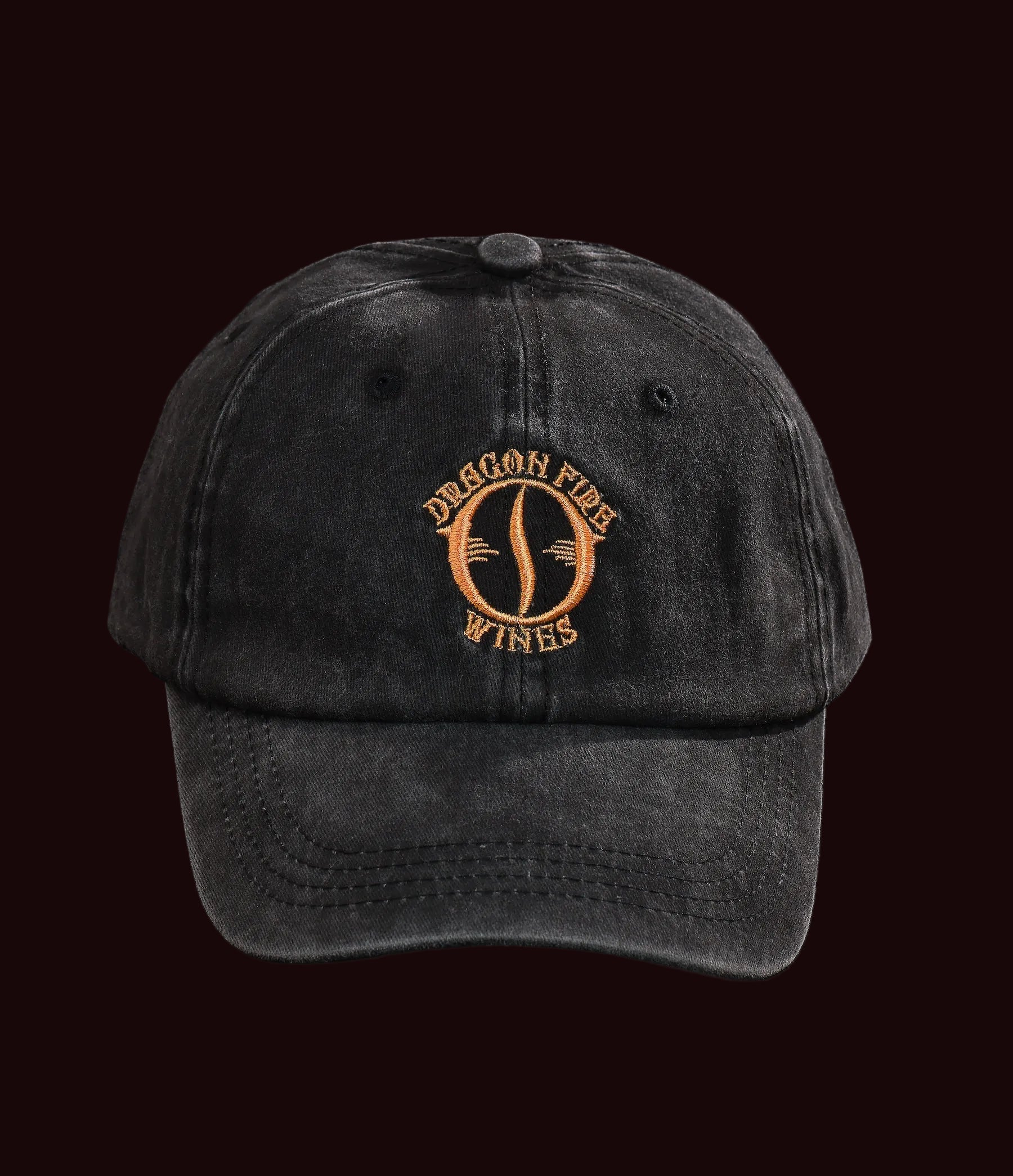 Black cap with 'Dragon Fire Wines' logo on a black background