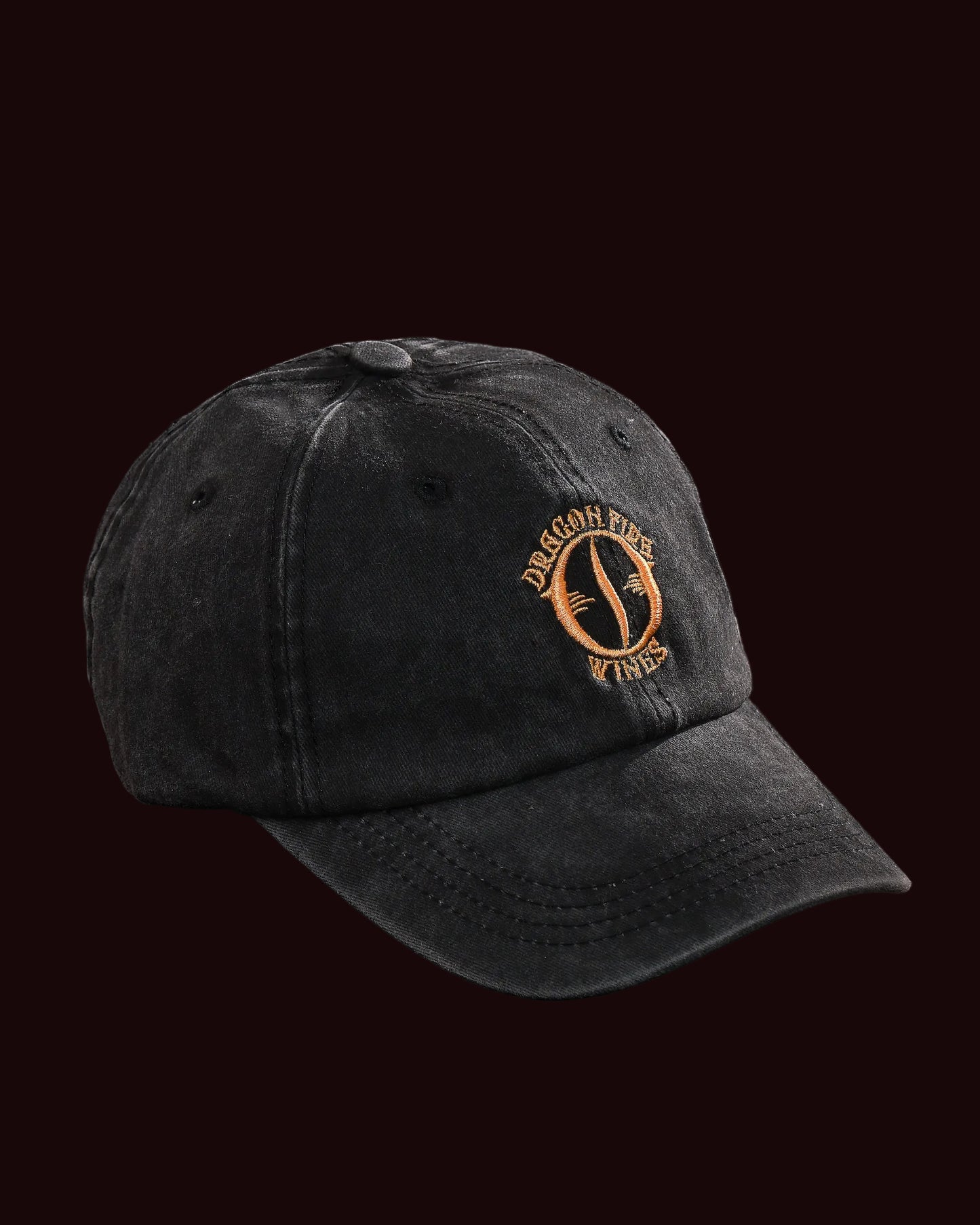Black cap with a logo on a black background